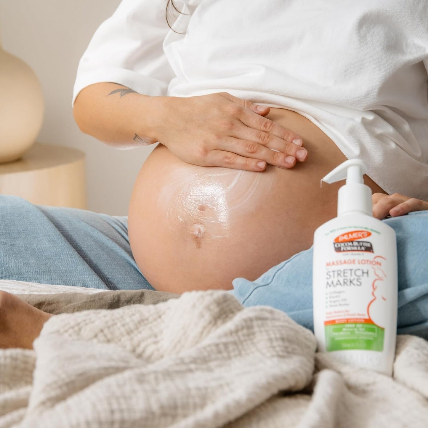 Palmer's_Cocoa_Butter_Formula_Massage_Lotion_For_Stretch_Marks,_Pregnancy_Skin_Care,_Belly_Cream_with_Collagen,_Argan_OIl_and_Shea_Butter,_8.5_Ounces