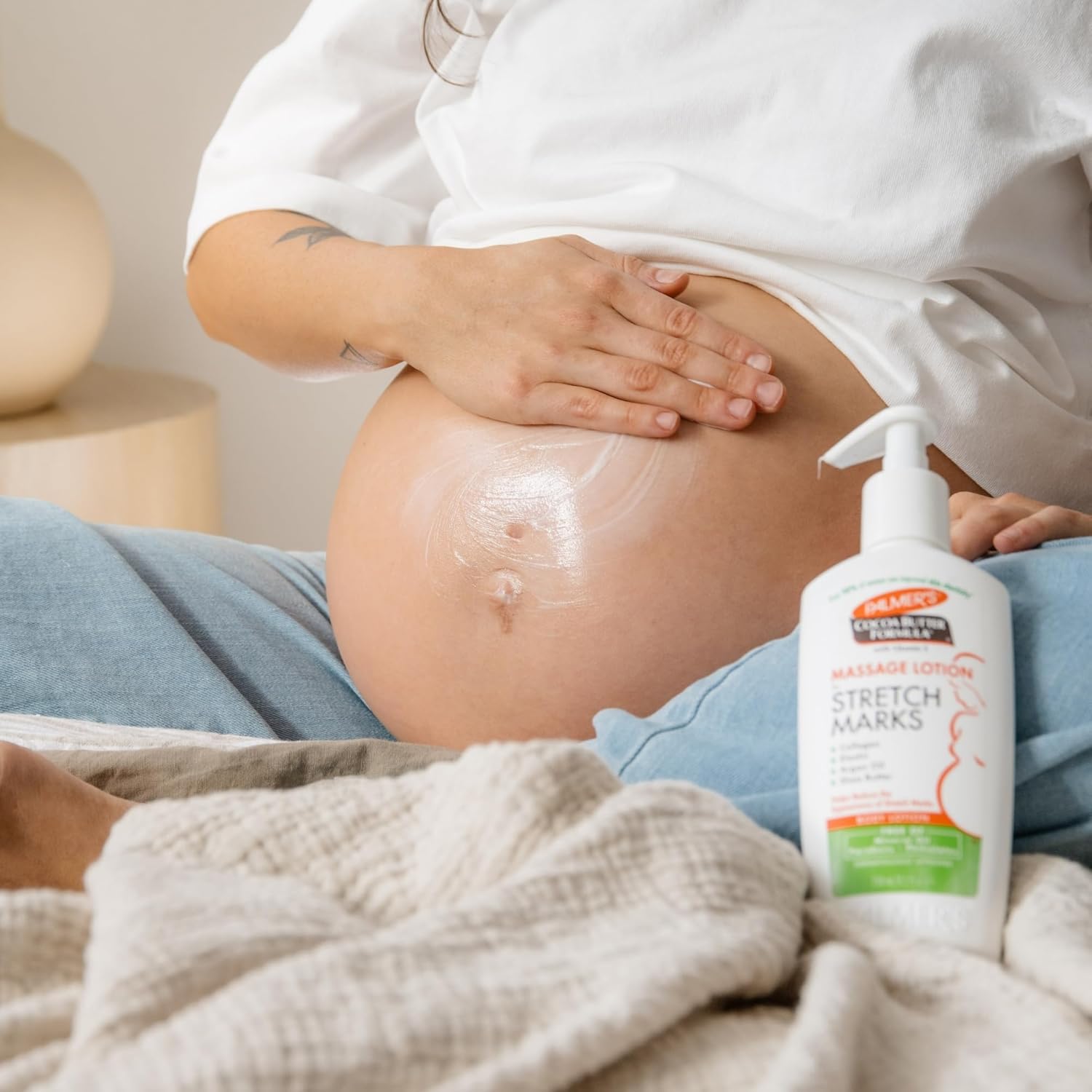 Palmer's_Cocoa_Butter_Formula_Massage_Lotion_For_Stretch_Marks,_Pregnancy_Skin_Care,_Belly_Cream_with_Collagen,_Argan_OIl_and_Shea_Butter,_8.5_Ounces