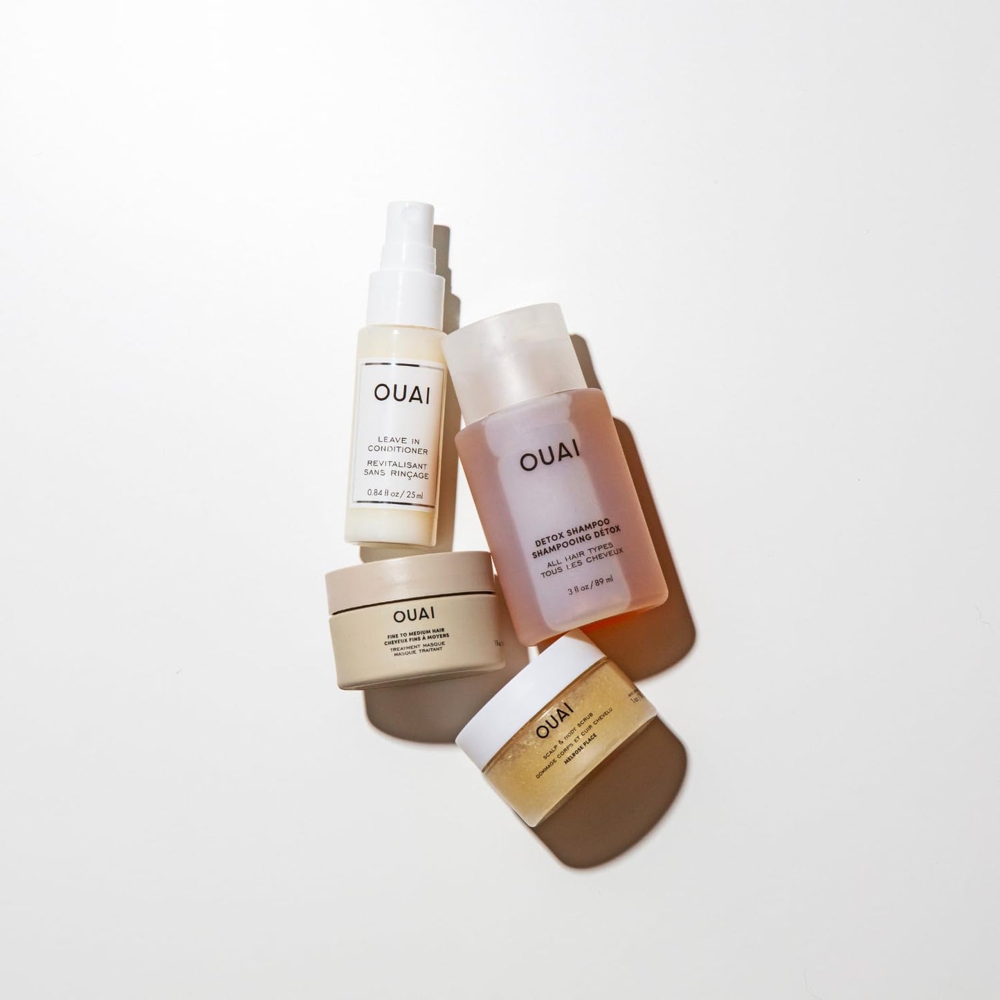 OUAI_Travel_Kit_-_Includes_Travel_Size_Leave_In_Conditioner,_Detox_Shampoo,_Fine_to_Medium_Hair_Mask,_Scalp_&_Body_Scrub_(4_Count)