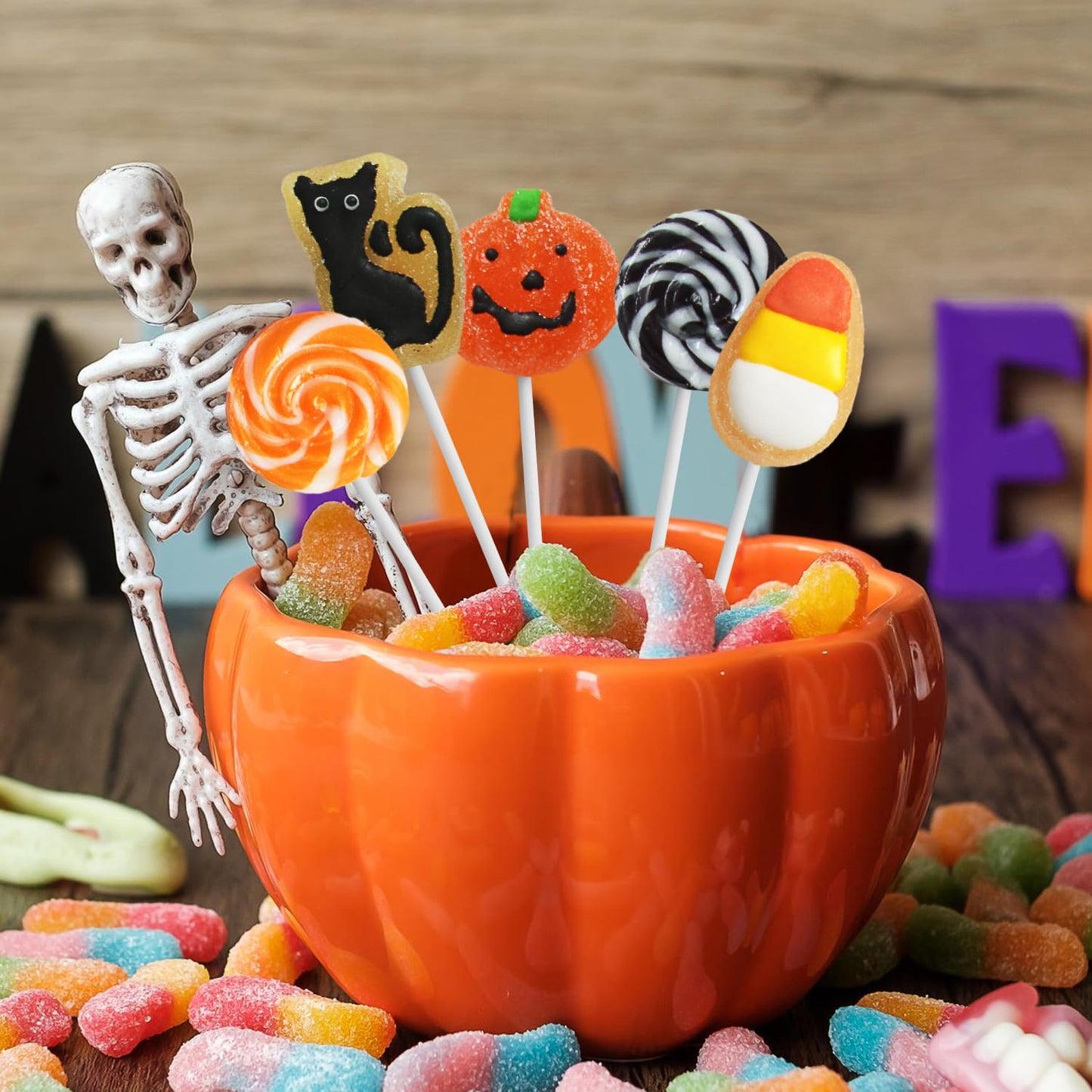 Halloween_Lollipop_Suckers,_24_Pieces_of_Bulk_Suckers_Individually_Wrapped,_Colorful_Candy_Lollipops_for_Trick_or_Treat_Bags,_Fun_Halloween_Shaped_Candy_Party_Favors