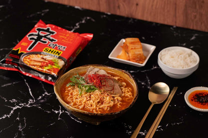 Nongshim_Shin_Ramyun_Noodles,_Spicy_Korean_Signature_Instant_Ramyun,_Rich_Beef_Flavored_Broth,_Microwaveable,_Korean_Instant_Noodles,_4.23_oz_(Pack_of_20),_Packaging_May_Vary.