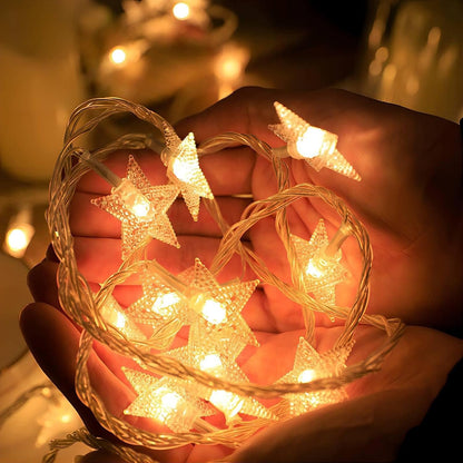 Christmas_Decor_Star_String_Lights,_20_FT_40_LED_Battery_Operated_Twinkle_Lights_Warm_White_Cute_Hanging_Star_Fairy_Light_for_Bedroom_Room_Office_Home_Camper_Indoor_Outdoor_Xmas_Tree_Decorations