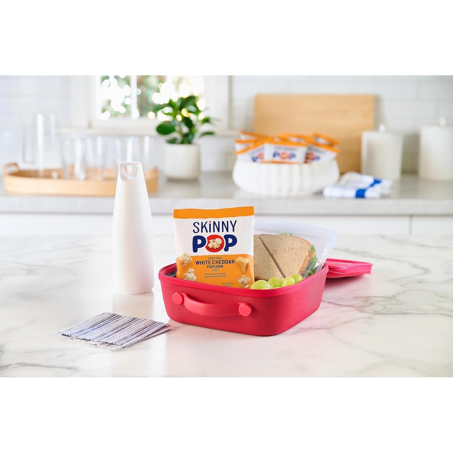 SkinnyPop_Popcorn,_White_Cheddar,_Whole_Grain,_Dairy-Free_Snack,_0.65oz_Bags_(6ct)