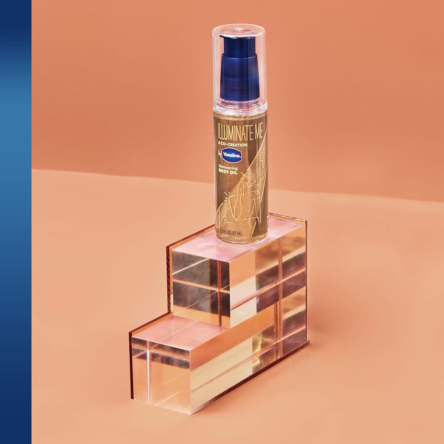 Vaseline_Illuminate_Me_Shimmering_Body_Oil_Created_for_Melanin_Rich_Skin,_Illuminates_Skin_with_Finishing_Touch_of_Shimmer_for_Glowing_Skin_3.3_oz