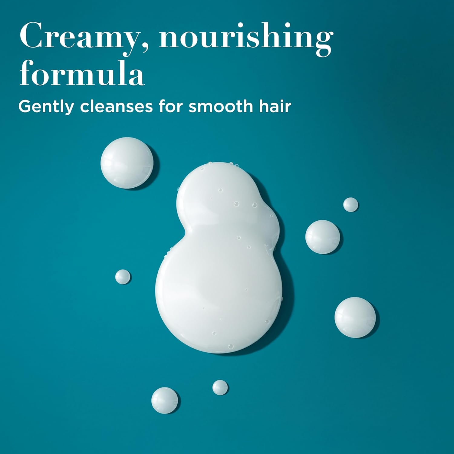 OGX_Nourishing_+_Coconut_Milk_Moisturizing_Shampoo,_Hydrating_&_Restoring_Shampoo_Moisturizes_for_Soft_Hair_After_the_First_Use,_Paraben-Free,_Sulfate-Free_Surfactants,_13_fl._oz