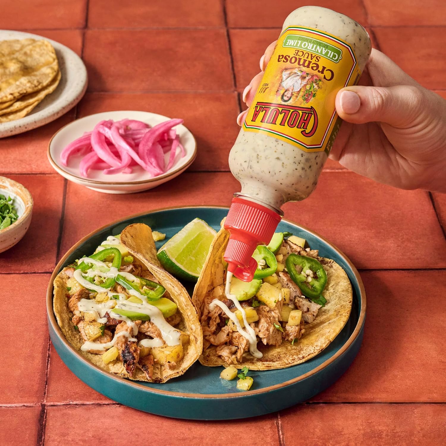 Cholula_Cremosa_Sauce,_Cilantro_Lime,_Mild_Heat,_Creamy_Squeezable_Topping_for_Tacos,_Enchiladas,_Soup,_Tostadas,_Eggs_and_More,_8_fl_oz