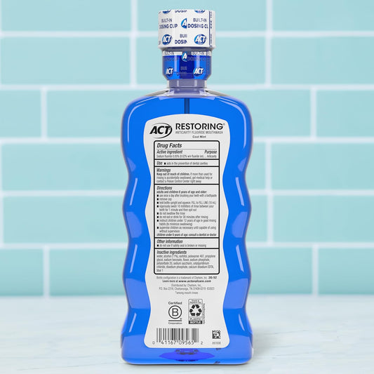 ACT_Restoring_Fluoride_Mouthwash_18_fl._oz._Strengthens_Tooth_Enamel,_Cool_Mint
