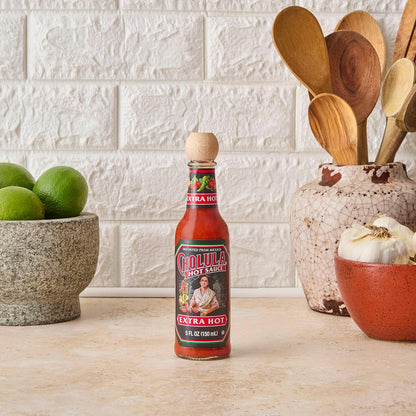 Cholula_Hot_Sauce,_Extra_Hot,_Product_of_Mexico,_Blend_of_Arbol_&_Piquin_Peppers_for_Bringing_Extra_Hot_Heat_to_Tacos,_Eggs,_Pizza_and_More,_5_fl_oz