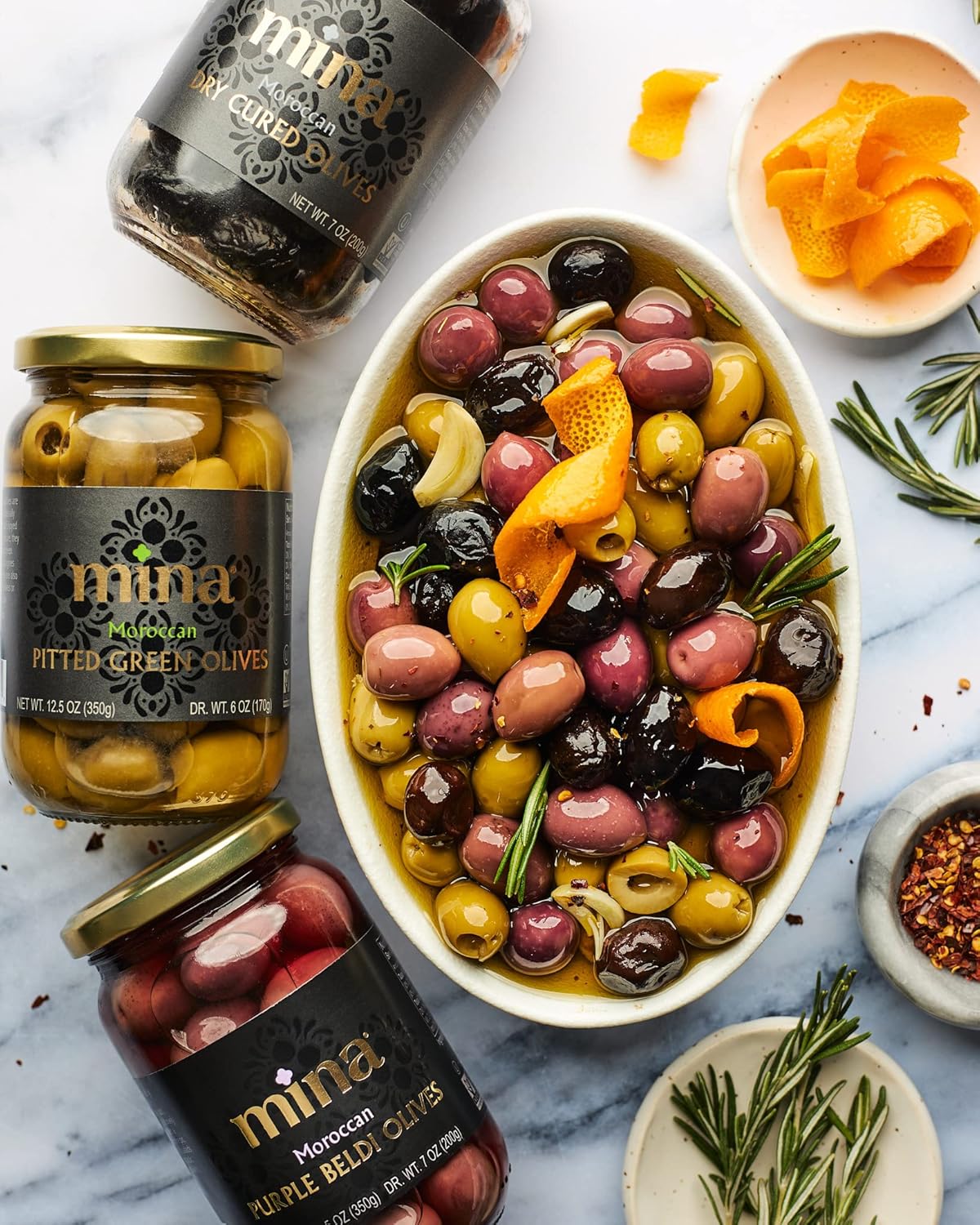 Mina_Dry_Cured_Black_Olives,_7_oz_-_Moroccan_Olive_Oil_Cured_Olives,_Premium_Handpicked_and_Naturally_Cured_Dried_Olives,_Non_GMO,_Gluten_Free,_Low_Carb,_Vegan,_Great_Paleo_Keto_Snacks