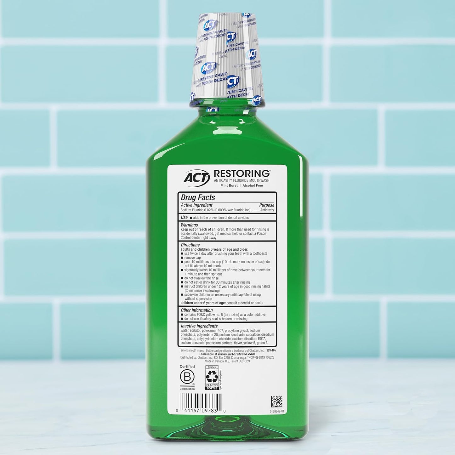 ACT_Restoring_Zero_Alcohol_Fluoride_Mouthwash_33.8_fl._oz._Strengthens_Tooth_Enamel,_Mint_Burst