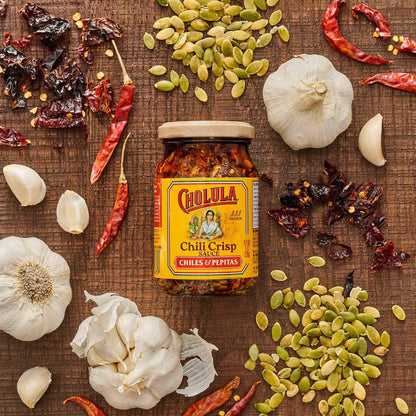 Cholula_Chili_Crisp_Sauce,_Chiles_&_Pepitas,_Crunchy_Topping_for_Tacos,_Tostadas,_Eggs,_Pizza_and_More,_8_oz