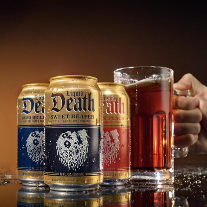Liquid_Death_Iced_Tea_-_Dead_Billionaire_(Black_Tea/Lemonade),_Less_Sugar*,_Boost_of_Caffeine,_B_Vitamins,_No_Artificial_Sweeteners,_12_Fl_Oz_(Pack_of_12)