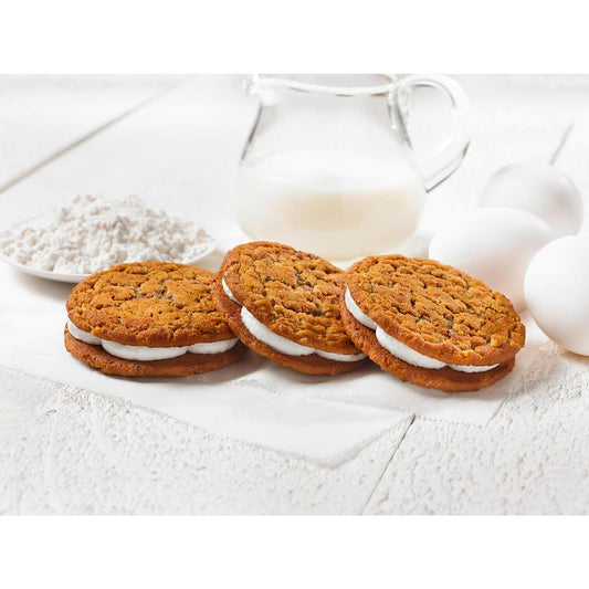 two soft oatmeal cookies sandwiching a sweet crème filling